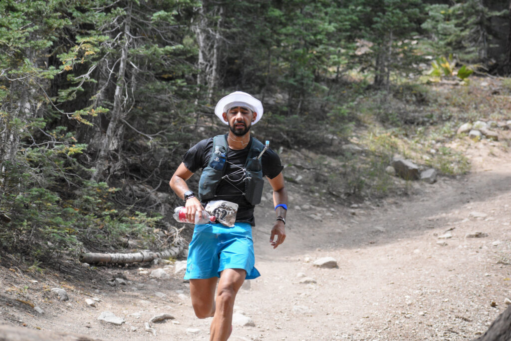 Runner coming into the aid station at castle peak